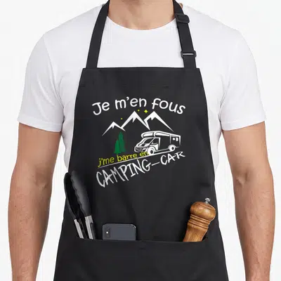 Tablier de cuisine noir avec illustration d un camping car blanc sous des montagnes et un pin vert.