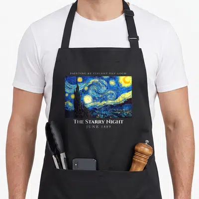 Tablier de cuisine noir avec une reproduction de The Starry Night et le texte Painting by Vincent Van Gogh.