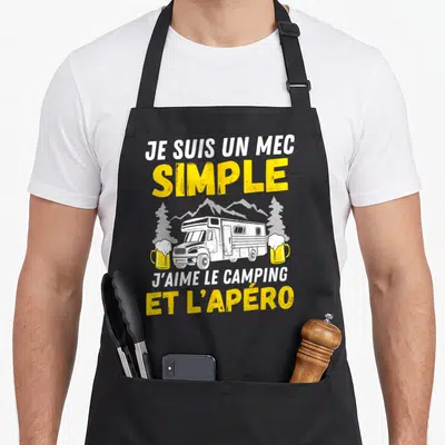 Tablier de cuisine noir avec inscription Mec simple j'aime le camping et l'apéro et illustration de camping-car, montagnes et bières.
