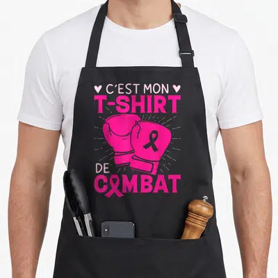 Tablier de cuisine noir avec gants de boxe roses et texte C'est mon vêtement de combat.