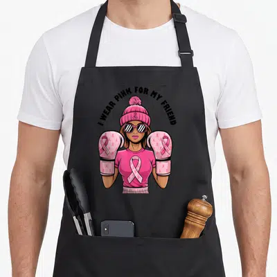 Tablier de cuisine noir avec une femme en gants de boxe roses et le texte « I Porte Rose Pour Mon Ami ».