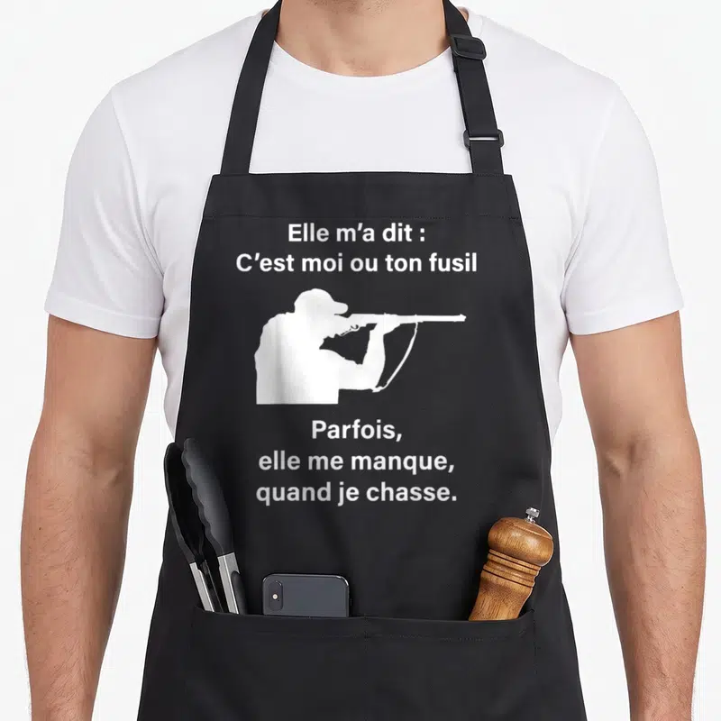 Tablier de cuisine noir avec silhouette blanche chasseur fusil et texte humoristique sur l'amour de la chasse