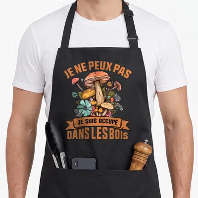 Tablier de cuisine noir avec illustration de cèpes et texte Je ne peux pas je suis occupé dans les bois.