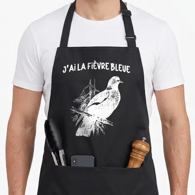 Tablier de cuisine noir avec illustration blanche d'un colombe et texte J'ai la fièvre bleue.