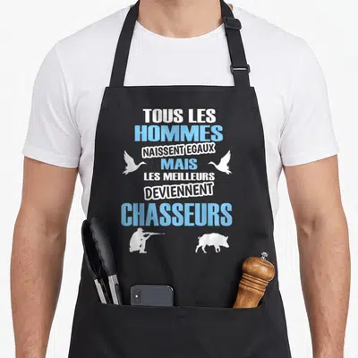 Tablier de cuisine noir avec inscription bleue et blanche sur la chasse aux oiseaux et au sanglier