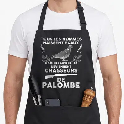 Tablier de cuisine noir avec inscription tous les hommes naissent égaux chasseur de palombe et illustration d'un pigeon blanc.