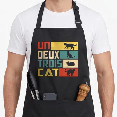 Tablier de cuisine noir avec motif Un Deux Trois Cat et silhouettes de chats sur bandes colorées