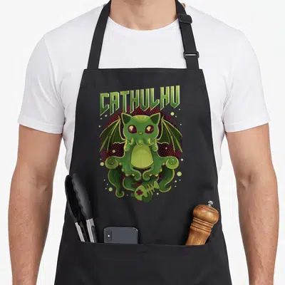 Tablier de cuisine noir avec illustration Cthulhu Kawaii vert aux ailes de chauve-souris et tentacules.