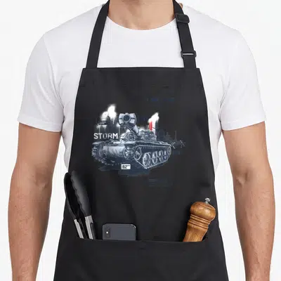 Tablier de cuisine noir avec illustration technique d'un char BAT.CHÂTILLON BOURRASQUE et le texte Perfect Storm en typographie urbaine.
