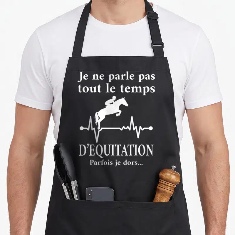 Tablier de cuisine noir avec silhouette saut d'obstacles et texte blanc sur fond uni