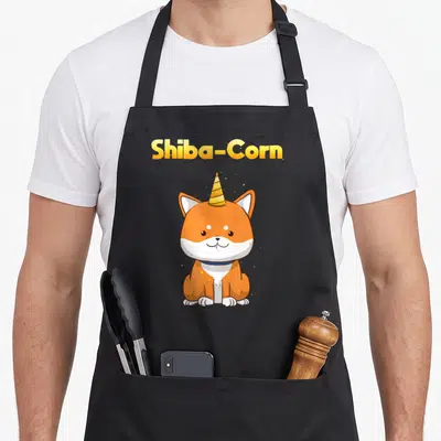 Tablier de cuisine noir avec illustration d'un shiba inu en licorne et le texte Shiba-Corn en lettres jaunes.