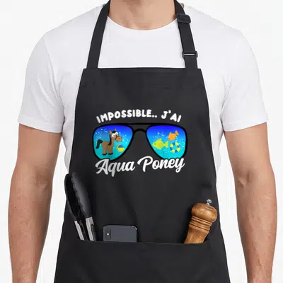 Tablier de cuisine noir avec lunettes de soleil illustrées d'un poney aquatique et du texte Impossible j'ai Aqua Poney