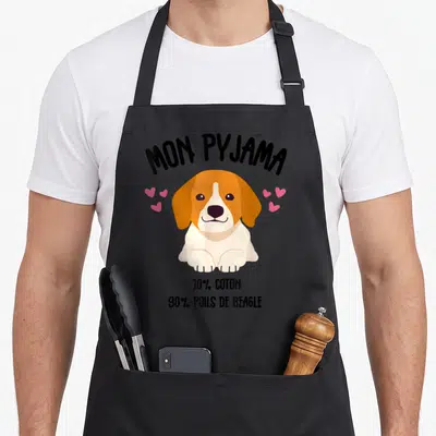 Tablier de cuisine noir avec illustration d'un chiot beagle et texte humoristique sur le pyjama.