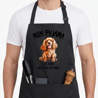 Tablier de cuisine noir avec illustration d'un cocker et texte Mon Pyjama 90 poils de cocker.