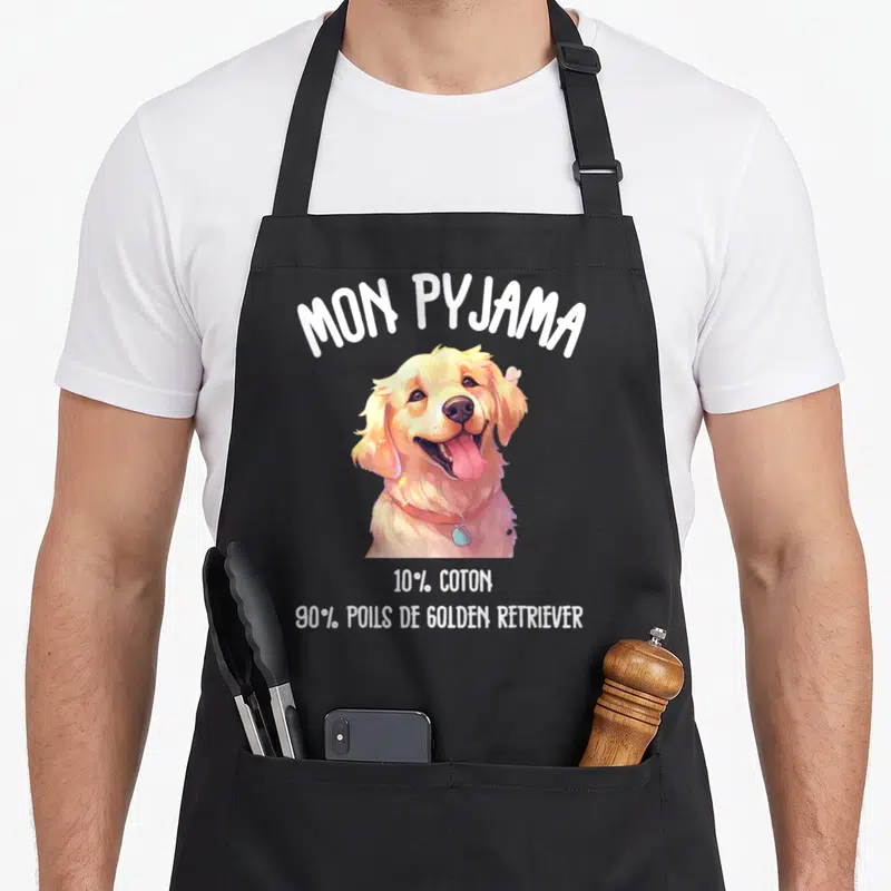 Tablier de cuisine noir avec illustration d'un Golden Retriever souriant et texte humoristique en blanc.