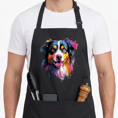 Tablier de cuisine noir avec portrait coloré d'un berger australien peint au style aquarelle urbaine
