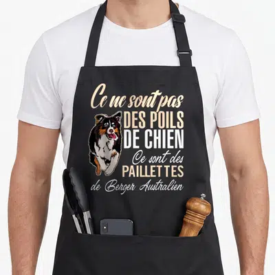 Tablier de cuisine noir avec illustration d'un Berger Australien et texte Ce ne sont pas des poils de chien ce sont des paillettes