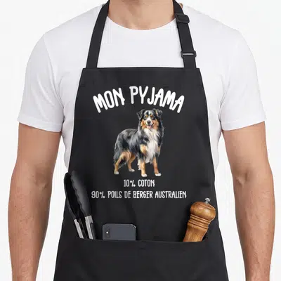 Tablier de cuisine noir avec illustration d'un Berger Australien et texte blanc Mon Pyjama 90 poils.