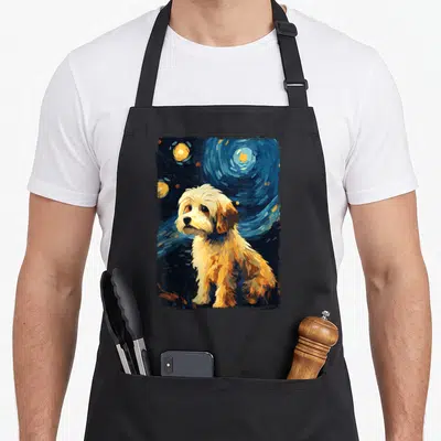 Tablier de cuisine noir avec illustration d'un chien Bichon Havanais sur fond de nuit étoilée bleue et jaune.