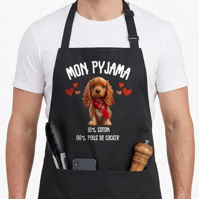 Tablier de cuisine noir avec illustration d'un cocker portant une écharpe rouge et des coeurs.