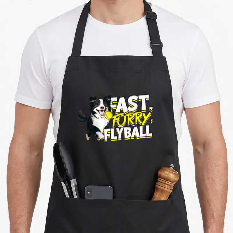 Tablier de cuisine noir avec un Border Collie courant et le texte FAST FURRY FLYBALL en lettres blanches et jaunes.