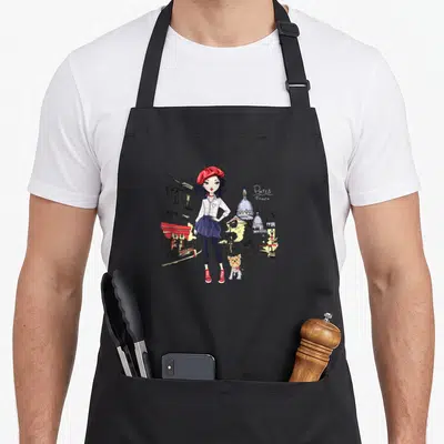 Tablier de cuisine noir avec illustration d'une fille au béret rouge et un chien de promenade devant le Sacré-Cœur.