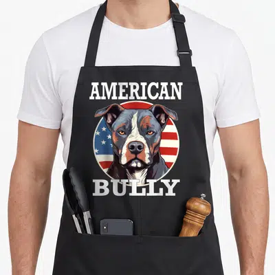Tablier de cuisine noir avec portrait American Bully Pit Bull Terrier USA sur fond de drapeau américain circulaire.