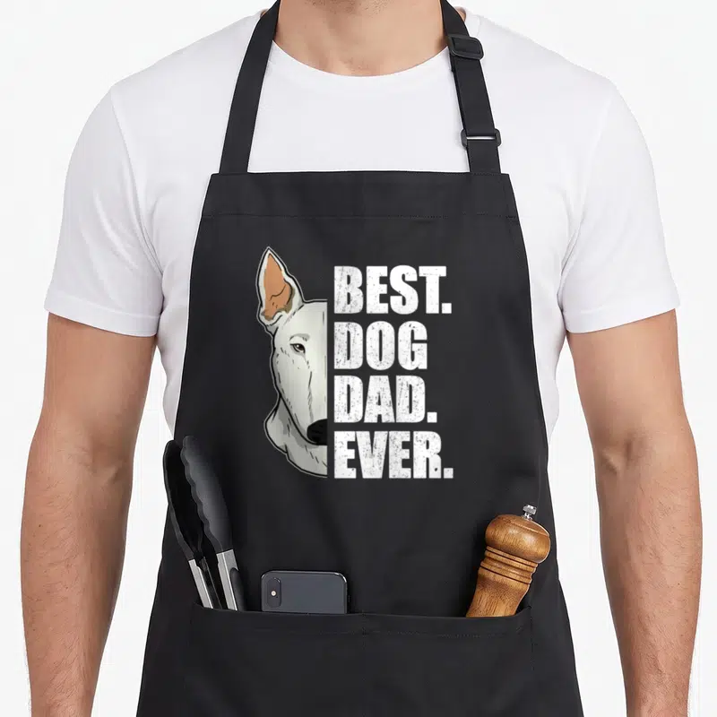 Tablier de cuisine noir avec illustration Bull Terrier et texte Best Dog Dad Ever en blanc.