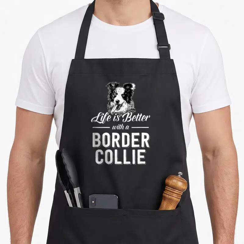 Tablier de cuisine noir avec tête de Border Collie et texte Life is Better with a BORDER COLLIE en blanc.
