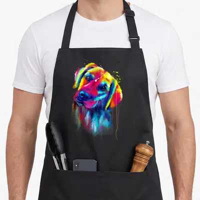 Tablier de cuisine noir avec un portrait de Golden Retriever multicolore style peinture urbaine et éclaboussures.