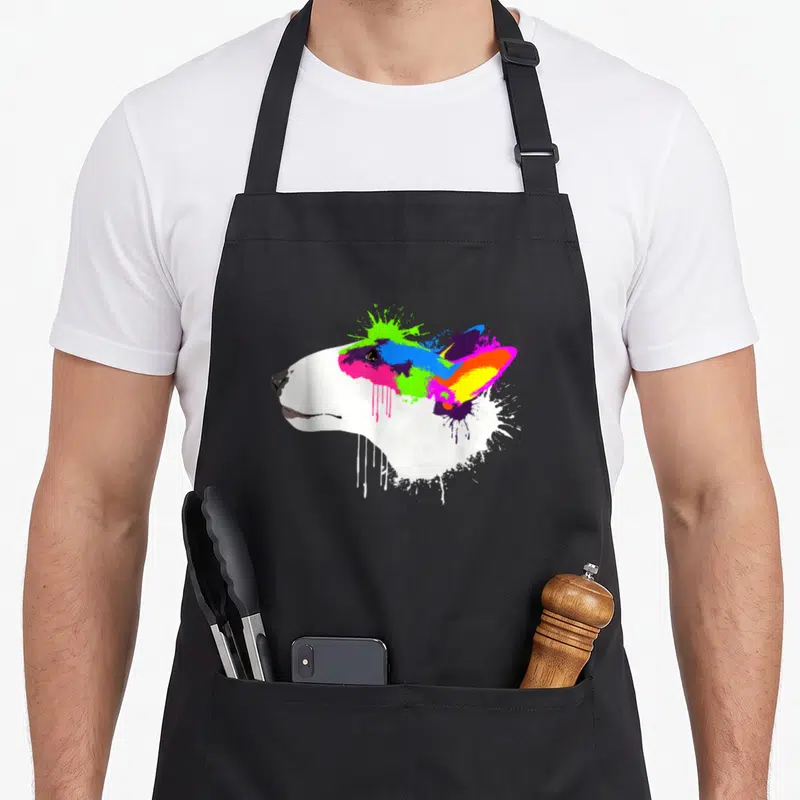 Tablier de cuisine noir avec illustration de profil de Bull Terrier en style splash art aux couleurs vives et éclaboussures fluorescentes.