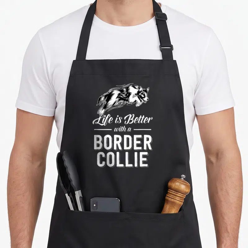 Tablier de cuisine noir avec illustration d'un Border Collie en mouvement et texte blanc Life is Better with a BORDER COLLIE.