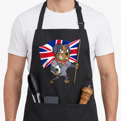 Tablier de cuisine noir avec chien fan anglais tenant un drapeau Union Jack et un ballon de football.