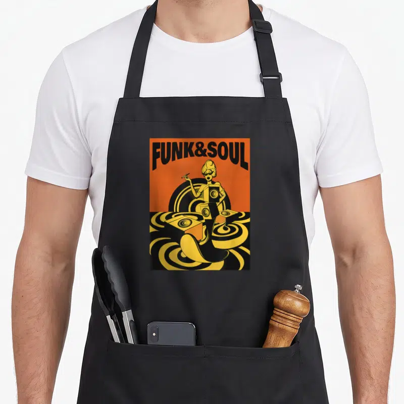 Tablier de cuisine noir avec illustration rétro orange jaune et texte Funk & Soul Old School Records.
