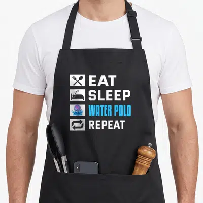 Tablier de cuisine noir avec l'inscription Eat Sleep Water Polo Repeat et des icônes blanches et bleues.