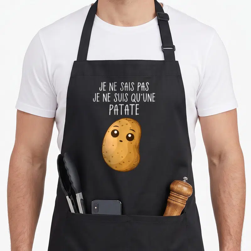 Tablier de cuisine noir avec une patate dessinée et le texte blanc Je ne sais pas je ne suis qu'une patate