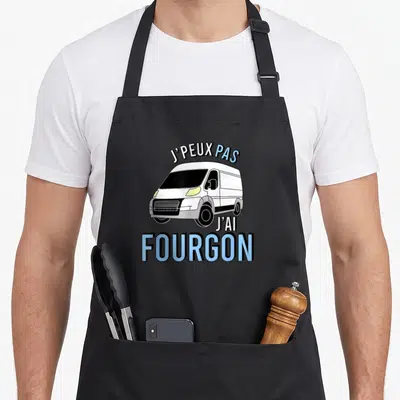 Tablier de cuisine noir avec illustration de fourgon blanc et texte J'peux pas j'ai fourgon en bleu et noir.