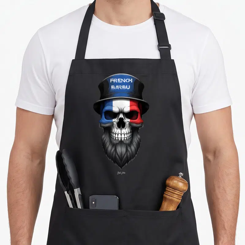 Tablier de cuisine noir avec un crâne barbu aux couleurs du drapeau français et un chapeau haut de forme.