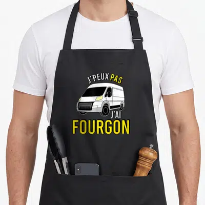 Tablier de cuisine noir avec illustration de fourgon blanc et texte J'peux pas j'ai fourgon en jaune et noir.