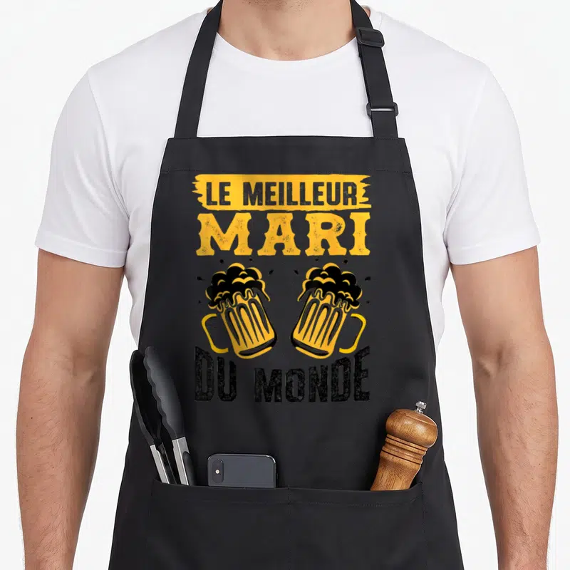 Tablier de cuisine noir avec le texte Le meilleur Mari du Monde et deux verres de bière s'entrechoquant en jaune et noir.