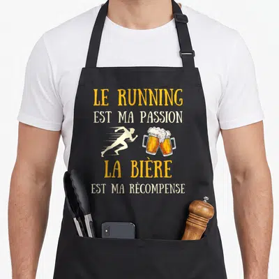 Tablier de cuisine noir avec le running est ma passion et la bière est ma récompense imprimé en jaune et blanc