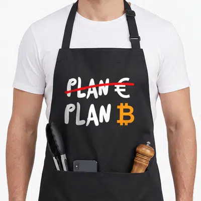Tablier de cuisine noir avec inscription Plan « Euro » barré et logo Bitcoin orange en dessous.