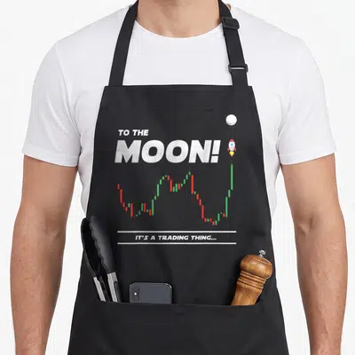 Tablier de cuisine noir avec le texte To the Moon, un graphique de trading et une fusée vers la lune.