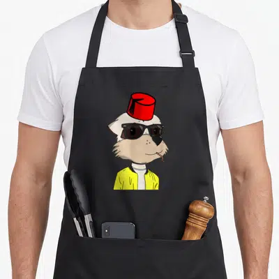 Tablier de cuisine noir avec illustration d'un suricate stylisé NFT coiffé d'un fez rouge et portant des lunettes noires.