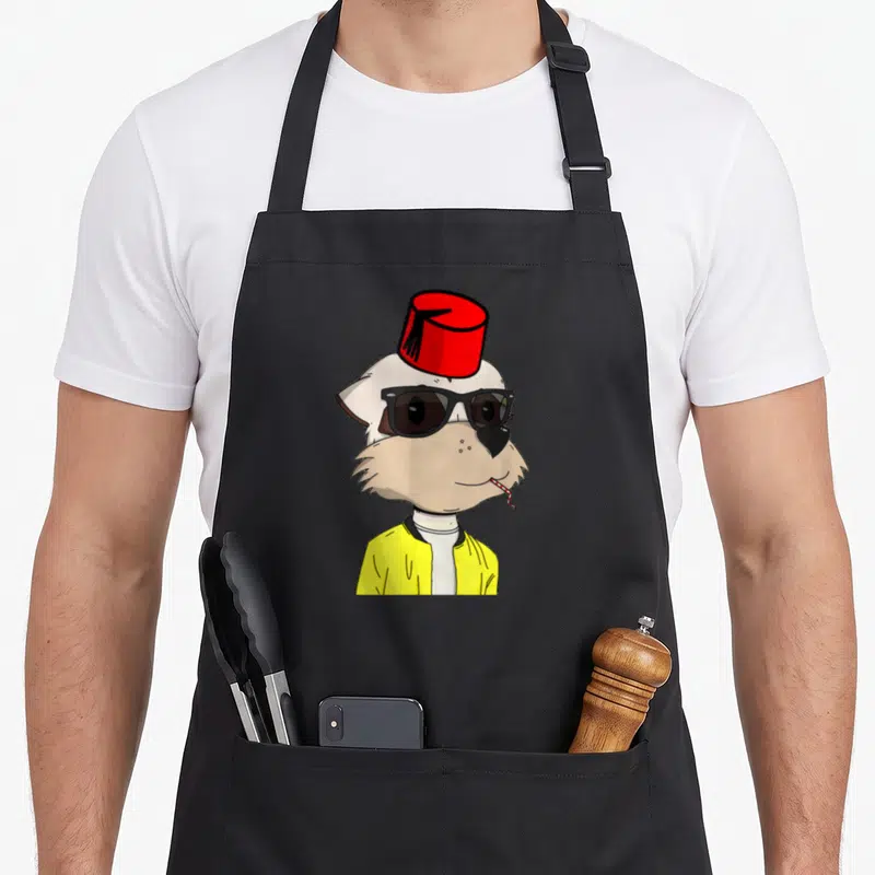 Tablier de cuisine noir avec illustration d'un suricate stylisé NFT coiffé d'un fez rouge et portant des lunettes noires.