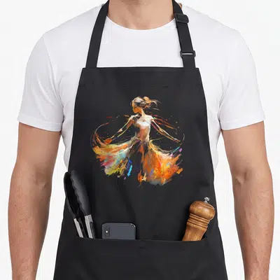 Tablier de cuisine noir avec une ballerine aux éclaboussures de peinture orange, jaune et bleue.