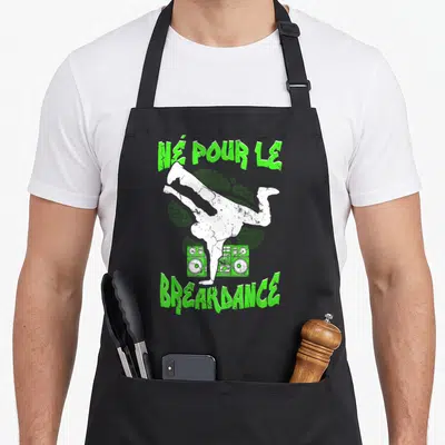 Tablier de cuisine noir avec illustration blanche et verte d'un danseur de break et une boombox.