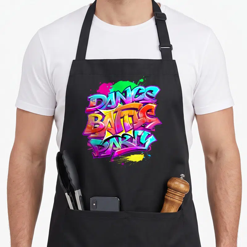 Tablier de cuisine noir avec illustration graffiti multicolore Dance Battle Party et éclaboussures de peinture.