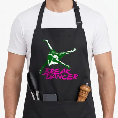 Tablier de cuisine noir avec silhouette verte de breakdancer et texte rose break dancer