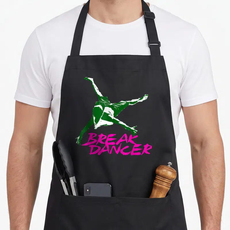 Tablier de cuisine noir avec silhouette verte de breakdancer et texte rose break dancer